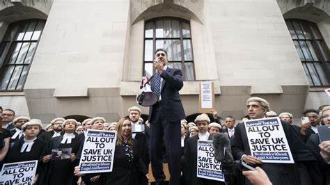 In a strike over pay, barristers leave the courts.