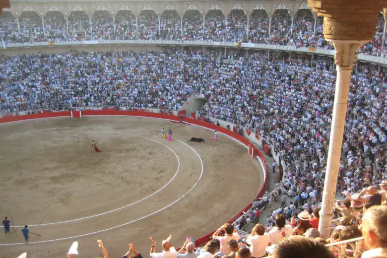 Hundreds are hurt after a wooden stand collapses during a bullfight, claiming four lives.