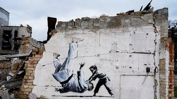 A group attempts to steal a Banksy mural in a Ukrainian town